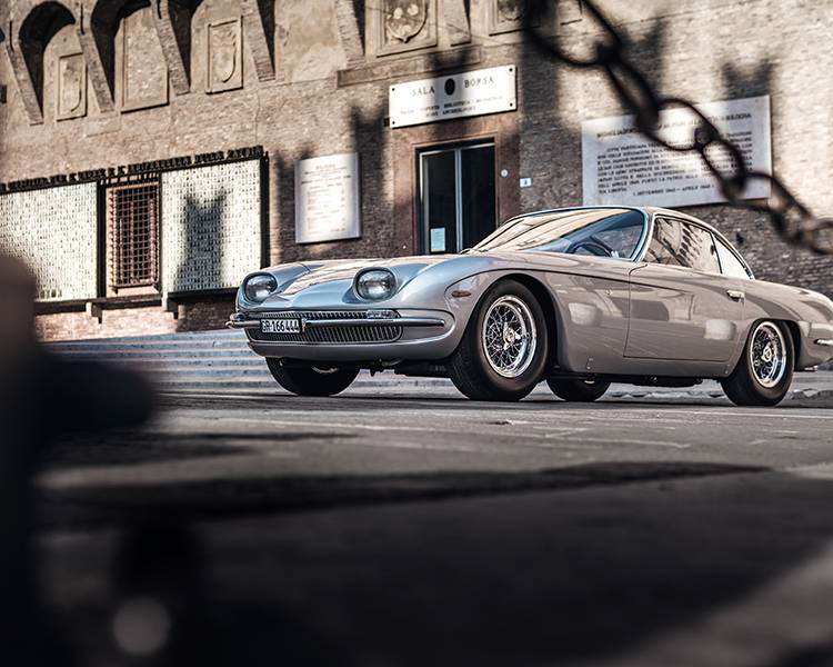Lamborghini 350 GT in front of historic building