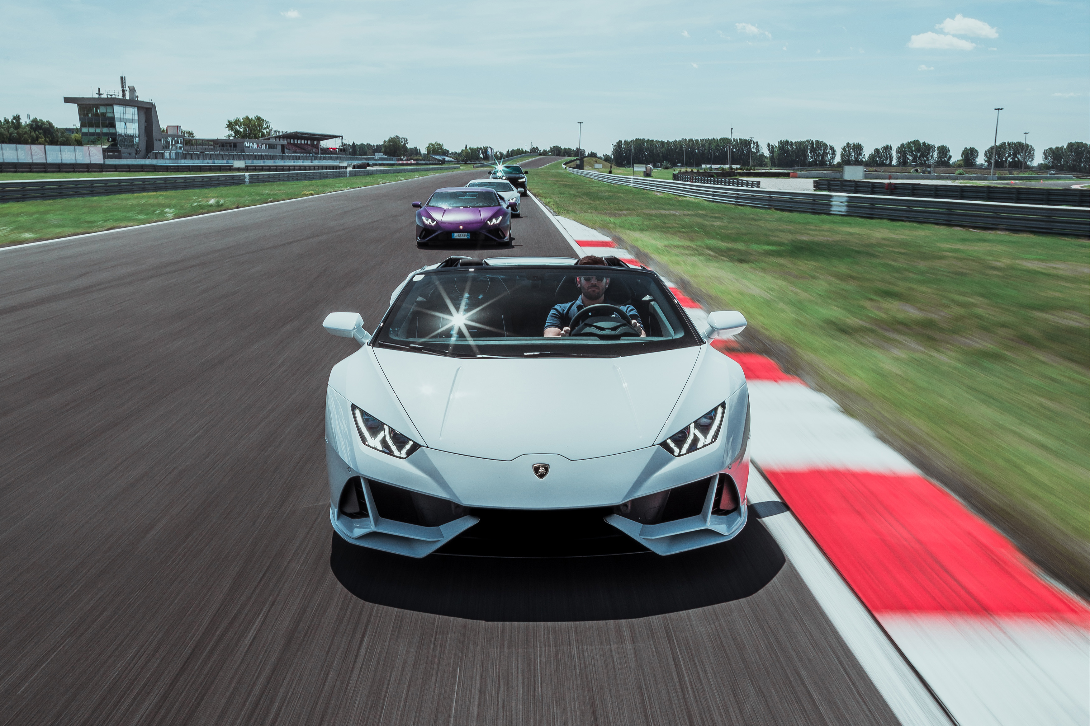 Lamborghini cars on race track